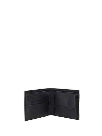 Shop Balenciaga Logo Print Flap-over Wallet In Black