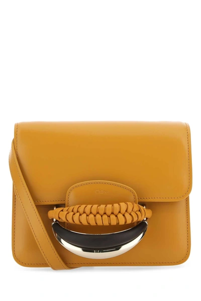 Shop Chloé Chloe Clutch In Yellow