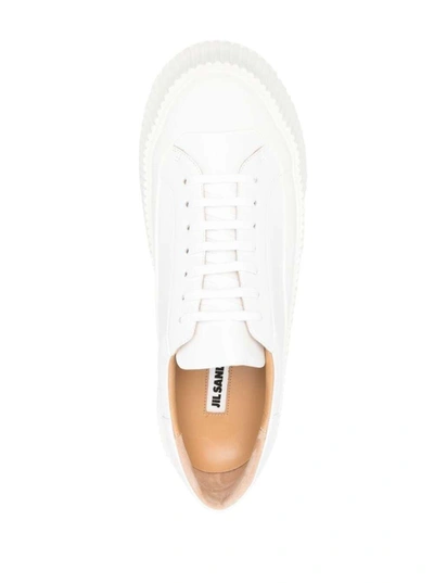 Shop Jil Sander Sneakers Beige