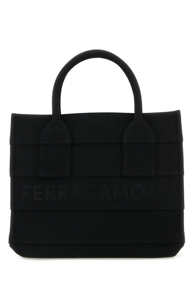 Shop Ferragamo Salvatore  Handbags. In Black
