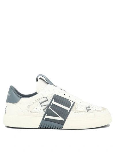 Shop Valentino Garavani Sneakers & Slip-on In White