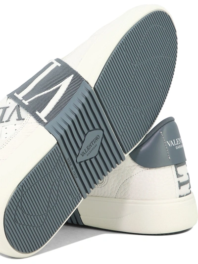Shop Valentino Garavani Sneakers & Slip-on In White