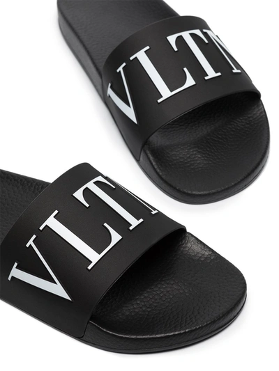 Shop Valentino Garavani Slippers In Black