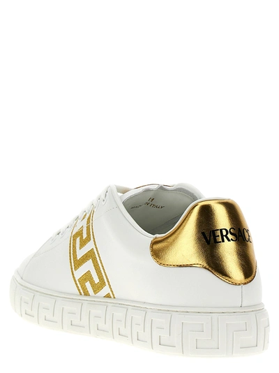 Shop Versace Sneakers In Gold