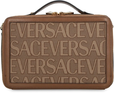Shop Versace Handbags. In Beige