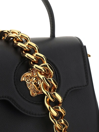 Shop Versace Black Leather Medusa Handle Bag In Nero/oro