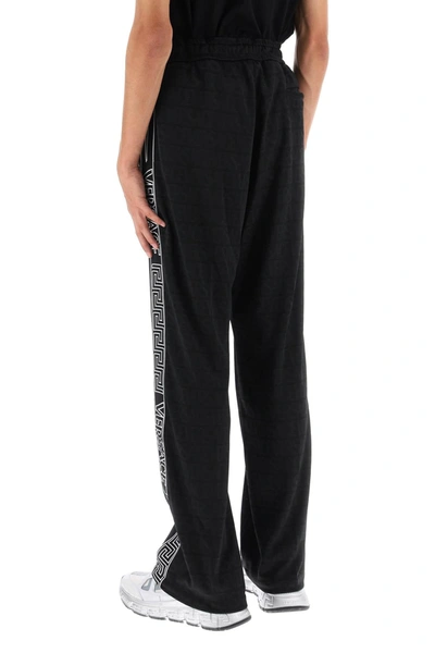 Shop Versace Black Polyester Pants