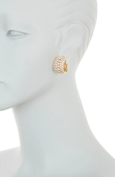 Shop Tasha Crystal Huggie Hoop Earrings In Gold