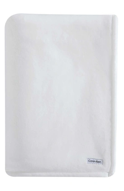 Shop Calvin Klein Core Plush Blanket In White