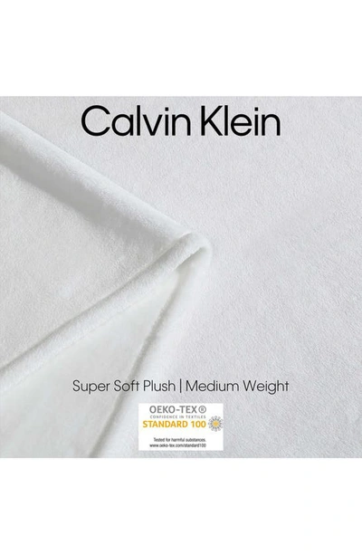 Shop Calvin Klein Core Plush Blanket In White
