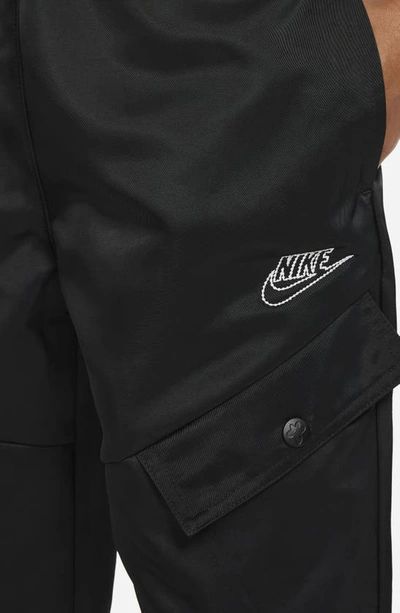Shop Nike Kids' Sportswear Water Repellent Cargo Pants In Black/ White