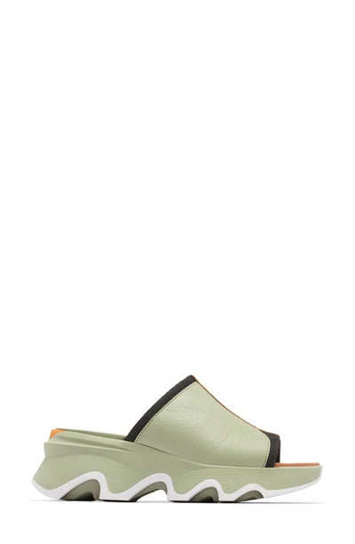 Shop Sorel Kinetic Impact Slide Sandal In Safari/ Dreamy