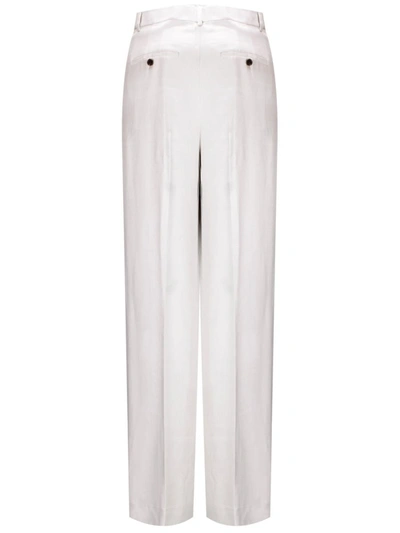 Shop Theory Trousers In Beige
