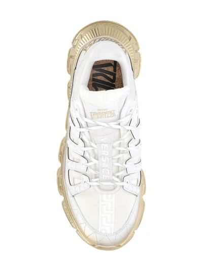 Shop Versace Sneakers In White+gold