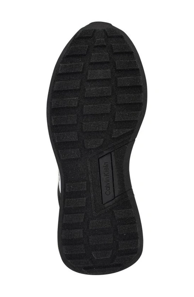 Shop Calvin Klein Hallie Wedge Sneaker In Black