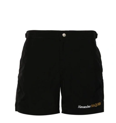Shop Alexander Mcqueen Logo-embroidered Swim Shorts In Black
