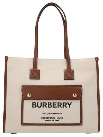 Shop Burberry Freya Small Shopping Bag In Beige