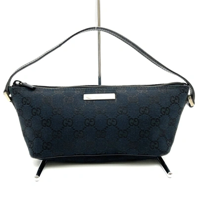 Shop Gucci Baguette Black Canvas Clutch Bag ()