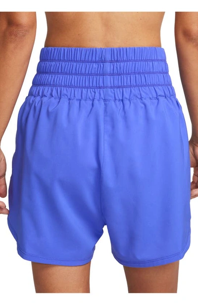 Shop Nike Dri-fit Ultrahigh Waist 3-inch Brief Lined Shorts In Blue Joy/ Reflective Silv