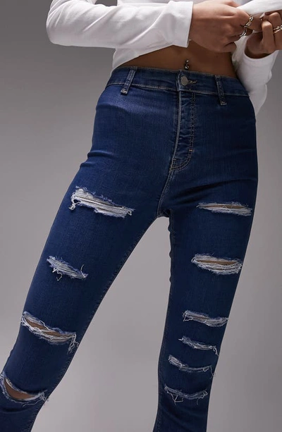 Shop Topshop Joni Distressed Jeans In Mid Blue