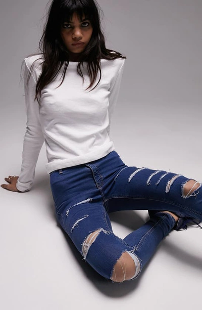 Shop Topshop Joni Distressed Jeans In Mid Blue