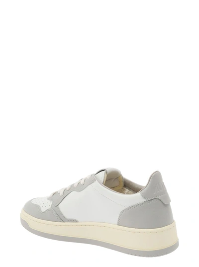 Shop Autry 'medalist' White And Grey Low Top Sneakers With Logo Detail In Leather Man