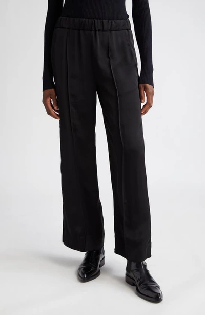 Shop Jil Sander Relaxed Fit Split Hem Track Pants In 001-black