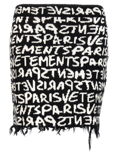 Shop Vetements 'graffiti Monogram' Skirt In White/black