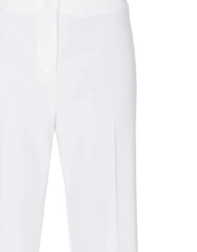Shop Pinko Trousers In White