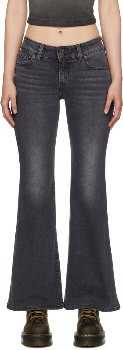 Shop Levi's Black Superlow Flare Jeans In Bringing Down House