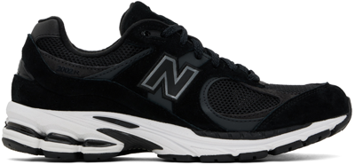 Shop New Balance Black 2002r Sneakers
