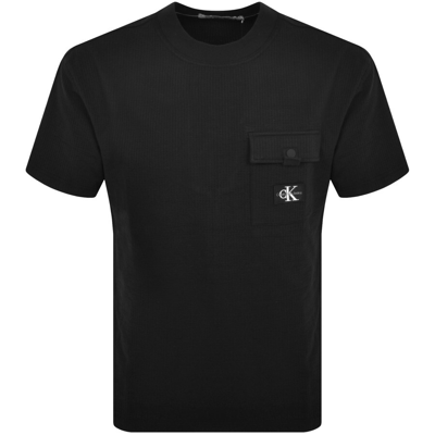 Shop Calvin Klein Jeans Logo T Shirt Black