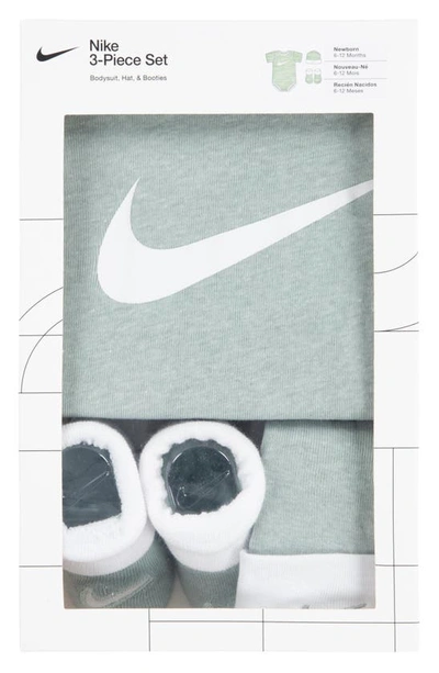 Shop Nike Swoosh Bodysuit, Crib Booties & Cap Set In Mica Green Heather
