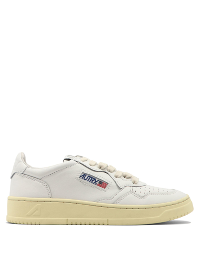 Autry Low-top Sneakers With Contrast Sole And Perforated Detailing In White