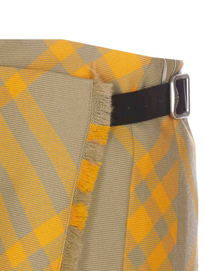 Burberry Fringed Pleated Checked Woven Mini Wrap Skirt In Yellow