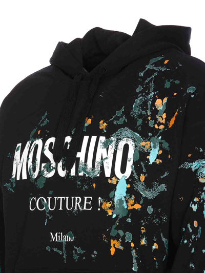 Shop Moschino Logo Hoodie In Black