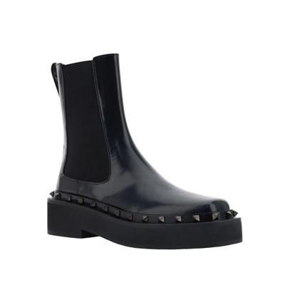 Shop Valentino Garavani  Garavani Rockstud M Way Boots