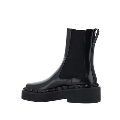 Shop Valentino Garavani  Garavani Rockstud M Way Boots