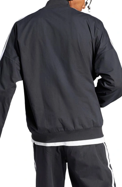 Shop Adidas Originals Tiro Oversize Woven Bomber Jacket In Black