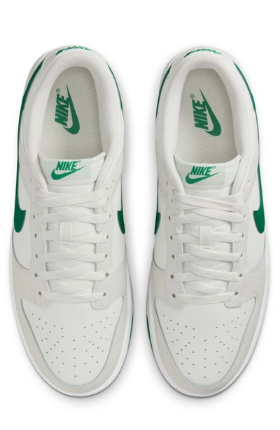 Shop Nike Dunk Low Retro Basketball Sneaker In White/ Malachite/ Platinum