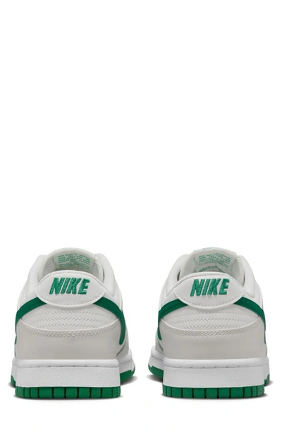 Shop Nike Dunk Low Retro Basketball Sneaker In White/ Malachite/ Platinum