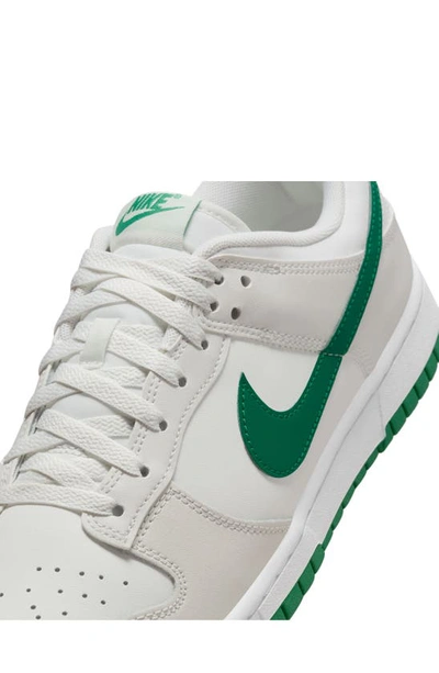 Shop Nike Dunk Low Retro Basketball Shoe In White/ Malachite/ Platinum