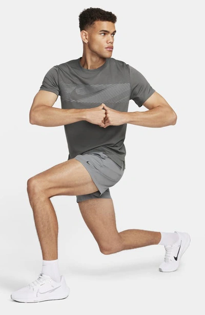 Shop Nike Dri-fit Miler Flash Running T-shirt In Iron Grey