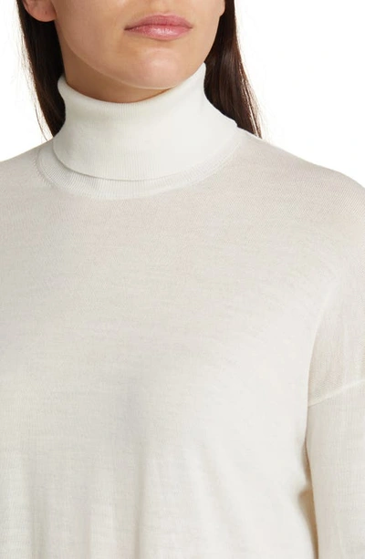 Shop Allsaints Gala Merino Wool Turtleneck Sweater In Chalk White