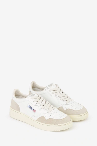 Shop Autry Sneakers In White