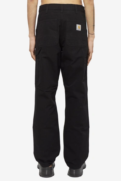 Shop Carhartt Wip Pants In Black