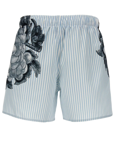 Shop Jw Anderson Light Blue Striped Swim Shorts