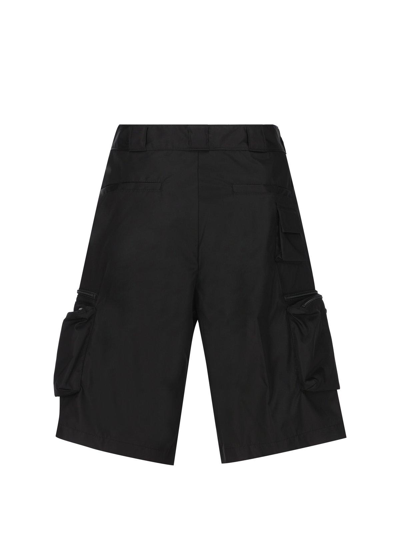 Shop Prada Logo Plaque Zipped Shorts In Nero
