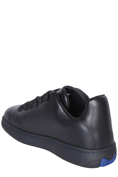 Shop Burberry Ekd Logo-embossed Lace-up Sneakers In Black