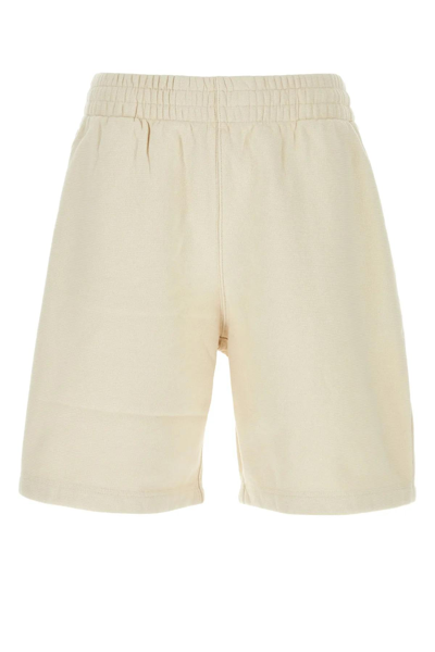 Shop Burberry Ivory Cotton Bermuda Shorts In Beige